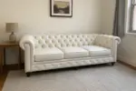 Chesterfield Sofa White shown in a realistic home living room setting