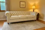 Chesterfield Sofa White shown in a realistic home living room setting