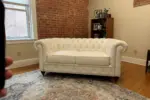 Chesterfield Sofa White shown in a realistic home living room setting