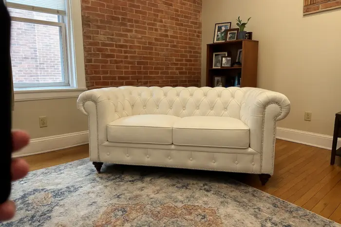 Chesterfield Sofa White shown in a realistic home living room setting