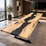 Custom live edge epoxy resin dining table with black river and metal base